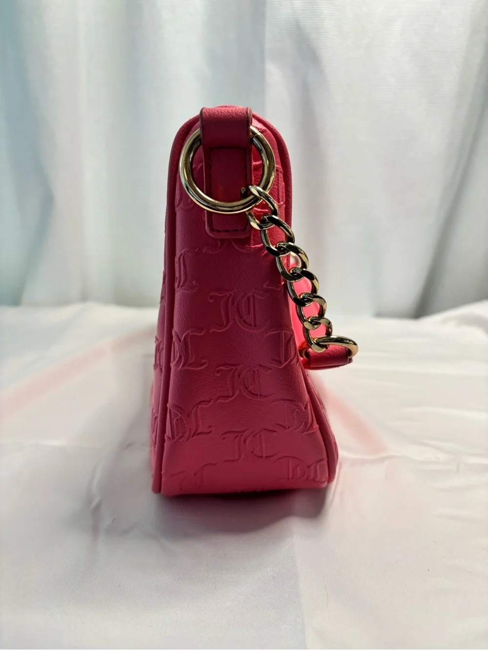 Juicy Couture Embossed hobo Bag with Gold Hardware and Crystal JC Logo